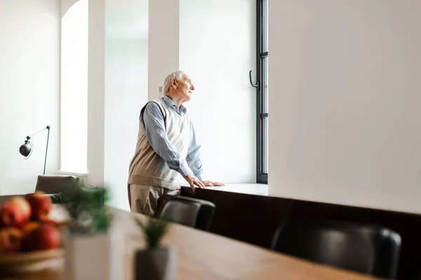 Upset Elderly Man Standing Window Quarantine Selective Focus — Stock Photo, Image