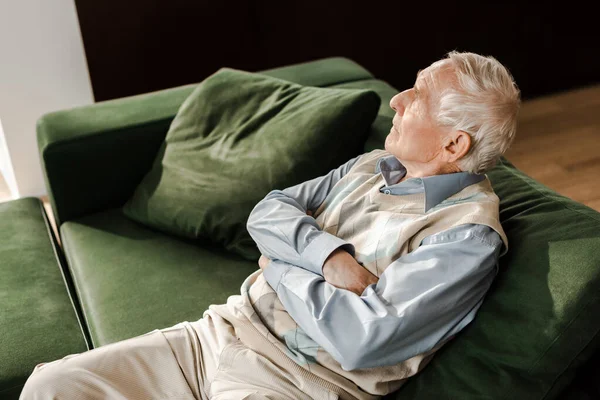 Sad Elderly Man Sitting Crossed Arms Sofa Quarantine — Stock Photo, Image