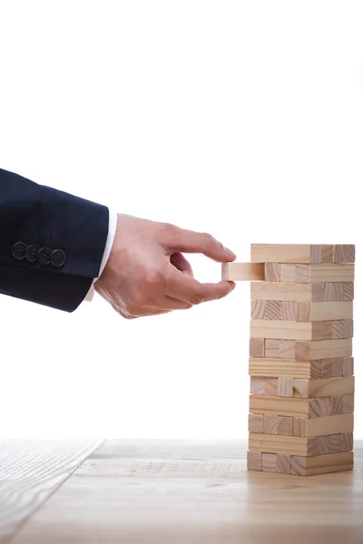 Businessman playing blocks wood game — Stock Photo