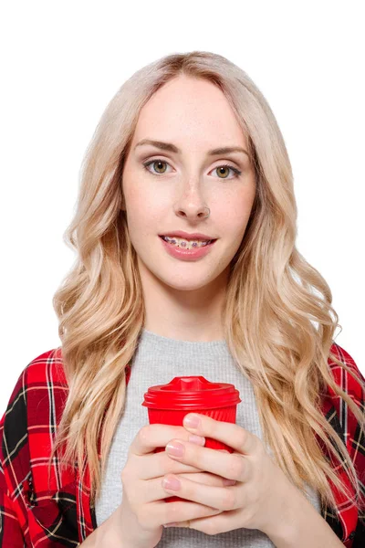 Woman holding disposable paper cup — Stock Photo