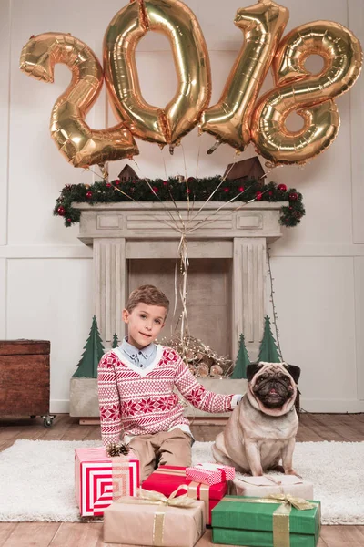 Boy with dog on christmas — Stock Photo