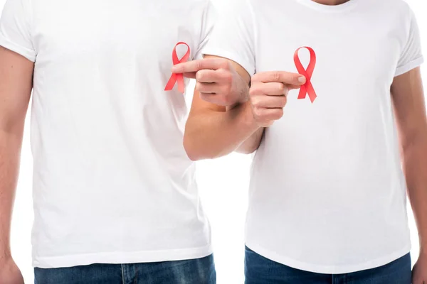 Gay couple with aids ribbons — Stock Photo