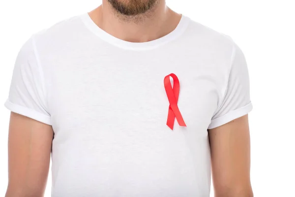 Man with aids ribbon attached to t-shirt — Stock Photo