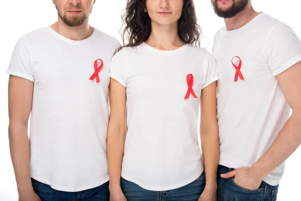 People in blank t-shirts with aids ribbons — Stock Photo