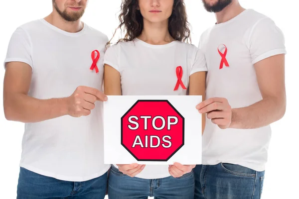 People with stop aids banner — Stock Photo