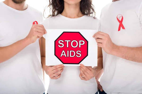 People with stop aids banner — Stock Photo