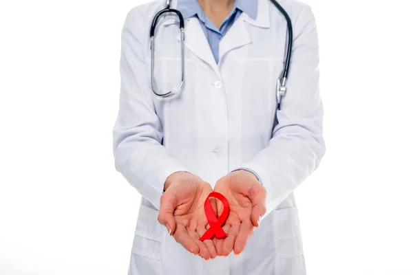 Doctor with aids ribbon — Stock Photo