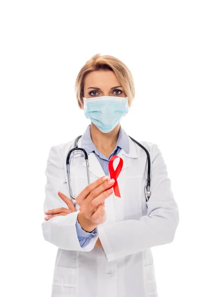 Doctor with aids ribbon — Stock Photo