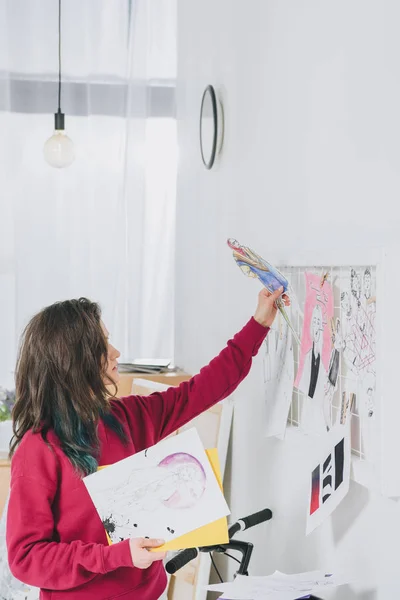 Attractive young girl creating mood board — Stock Photo