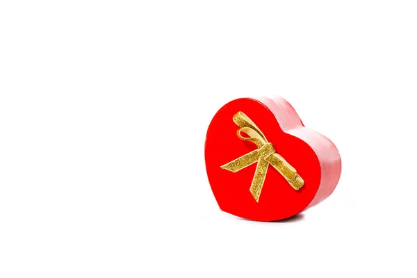 Close-up view of red heart shaped gift isolated on white — Stock Photo