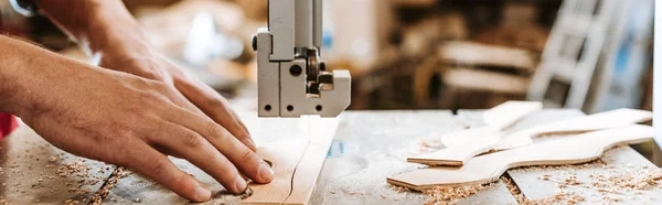 Panoramic shot of carpenter using cnc machine — Stock Photo