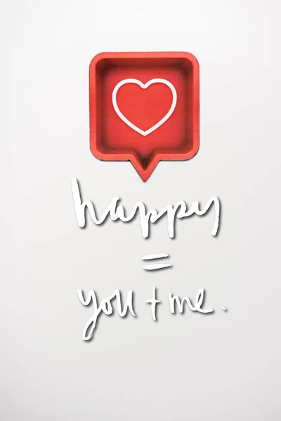 Top view of red speech bubble with heart near happy equal you plus me letters on white — Stock Photo