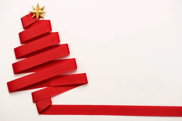 Top view of red ribbon with star shape bow isolated on white — Stock Photo