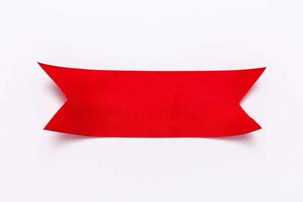 Vista superior da fita decorativa vermelha no branco — Fotografia de Stock