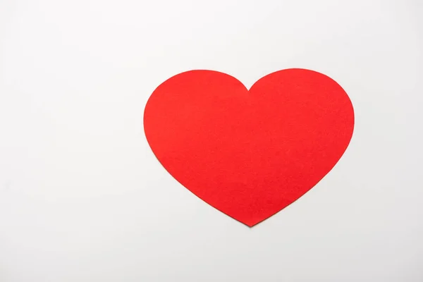 Top view of red heart shape paper cut isolated on white — Stock Photo
