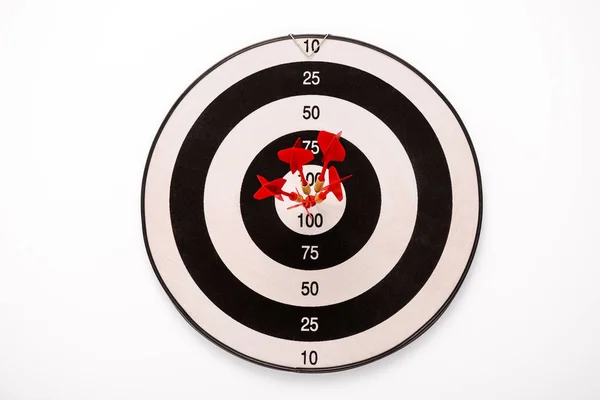 Black and white dartboard with red arrows isolated on white — Stock Photo