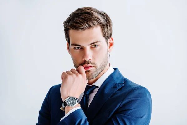 Schöner Geschäftsmann im blauen Anzug isoliert auf weißem Grund — Stockfoto