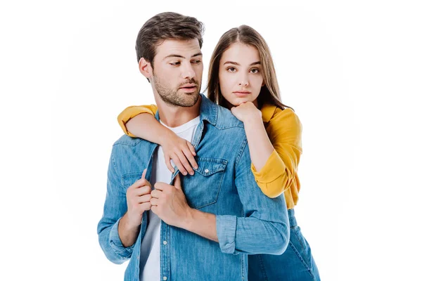 Triste linda menina abraçando namorado isolado no branco — Fotografia de Stock