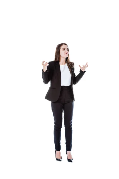 Piena vista lunghezza di donna d'affari arrabbiata in abito isolato su bianco — Foto stock