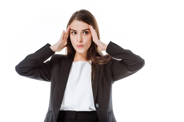 Donna d'affari stressata in tuta toccare la testa isolata su bianco — Foto stock