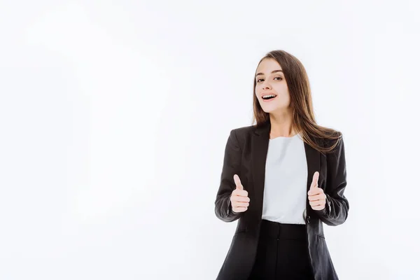 Happy businesswoman in suit showing thumbs up isolated on white — Stock Photo