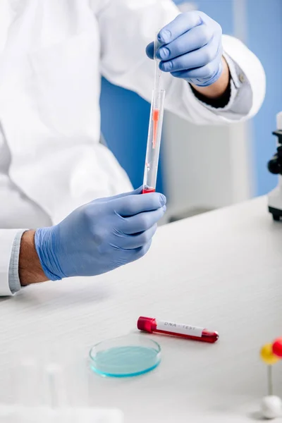 Cropped view of genetic consultant doing dna test in lab — Stock Photo