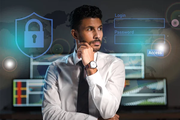 Pensive bi-racial trader looking away near login and password letters in office — Stock Photo