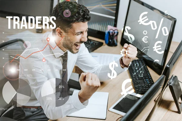 Happy bi-racial man showing yes gesture near computers and traders letters — Stock Photo