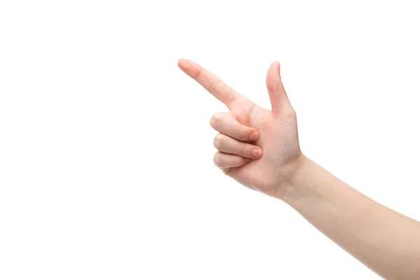 Abgeschnittene Ansicht einer Frau, die mit dem Finger auf Weiß zeigt — Stockfoto