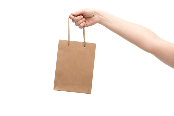 Cropped view of woman holding shopping bag isolated on white — Stock Photo