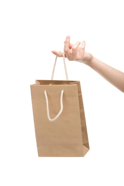 Cropped view of woman holding shopping bag isolated on white — Stock Photo