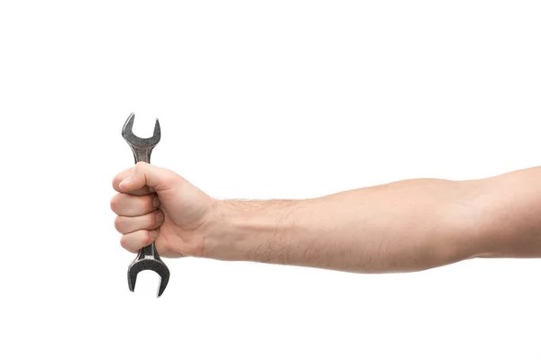 Cropped view of man holding spanner isolated on white — Stock Photo