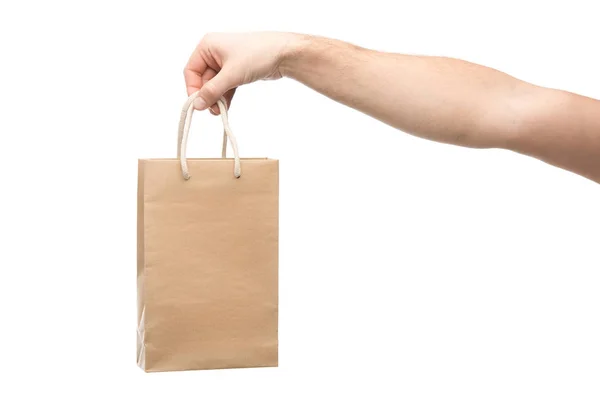 Cropped view of man holding shopping bag isolated on white — Stock Photo