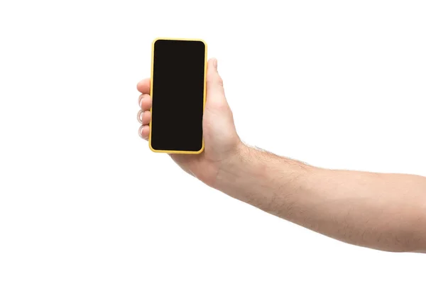Обрізаний вид людини, що тримає смартфон ізольовано на білому — стокове фото