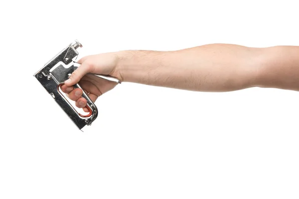 Cropped view of man holding construction stapler isolated on white — Stock Photo