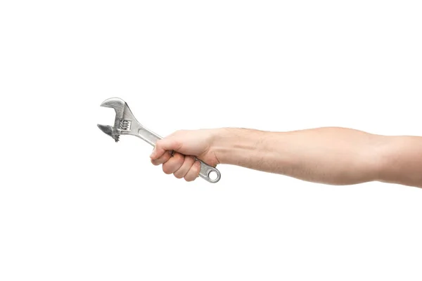 Cropped view of man holding spanner isolated on white — Stock Photo