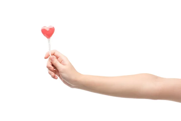 Cropped view of woman holding lollipop isolated on white — Stock Photo