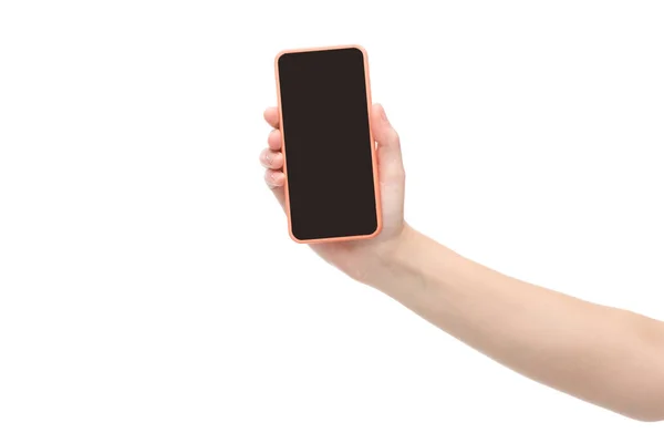 Vista recortada de la mujer sosteniendo teléfono inteligente aislado en blanco - foto de stock