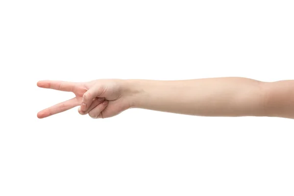 Cropped view of woman showing peace gesture isolated on white — Stock Photo