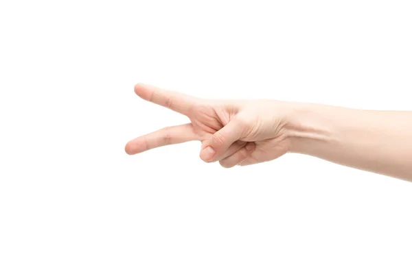 Cropped view of woman showing peace gesture isolated on white — Stock Photo