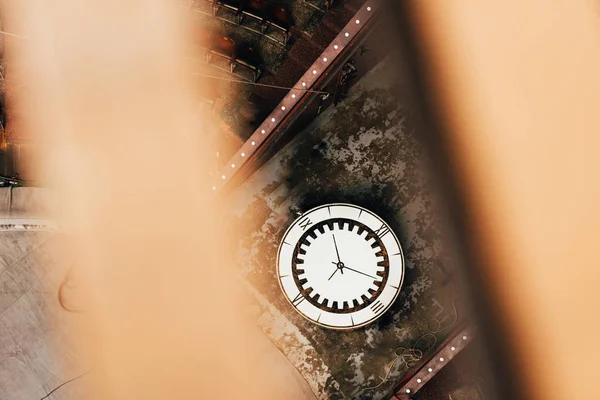 Top view of retro wall clock and arena in circus, selective focus — Stock Photo