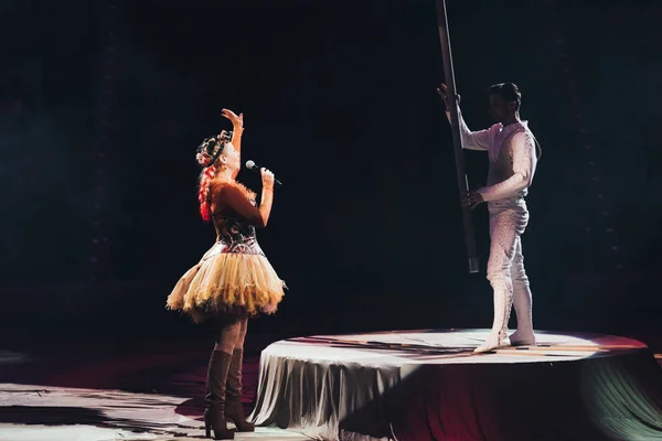 KYIV, UKRAINE - NOVEMBER 1, 2019: Side view of air gymnast and artist at circus stage — Stock Photo