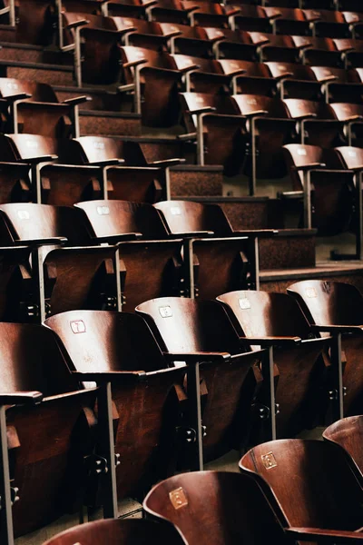 Empty wooden chairs with numbers in circus — Stock Photo