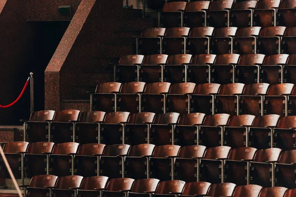 Empty wooden seats and entrance in circus — Stock Photo