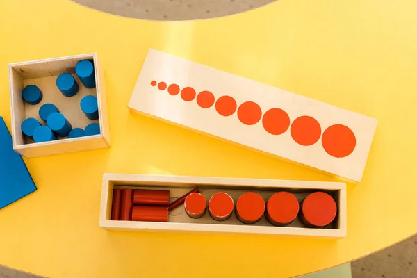 Top view of wooden educational game on desk in class — Stock Photo