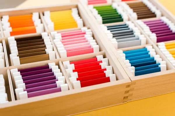 Selective focus of educational game in wooden boxes on table — Stock Photo