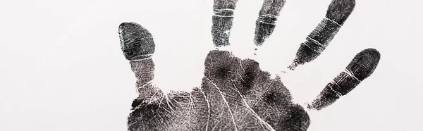 Панорамный снимок черного отпечатка руки, изолированного на белом, концепции прав человека — стоковое фото
