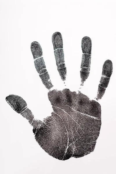 Вид сверху на отпечаток руки, изолированный на белом, концепция прав человека — стоковое фото