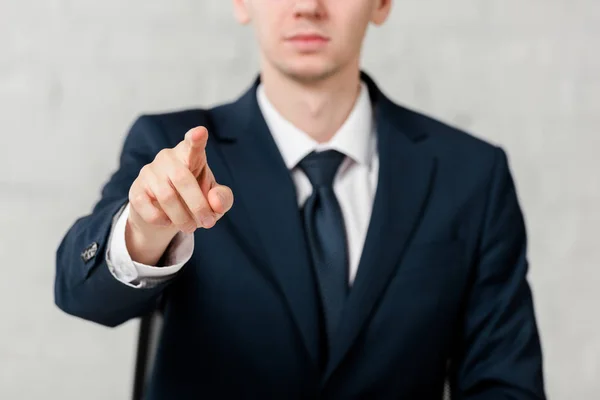 Cropped view of realtor pointing with finger isolated on white, leasing concept — Stock Photo