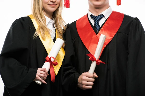 Вид спереду студентів, які тримають дипломи ізольовані на білому — стокове фото